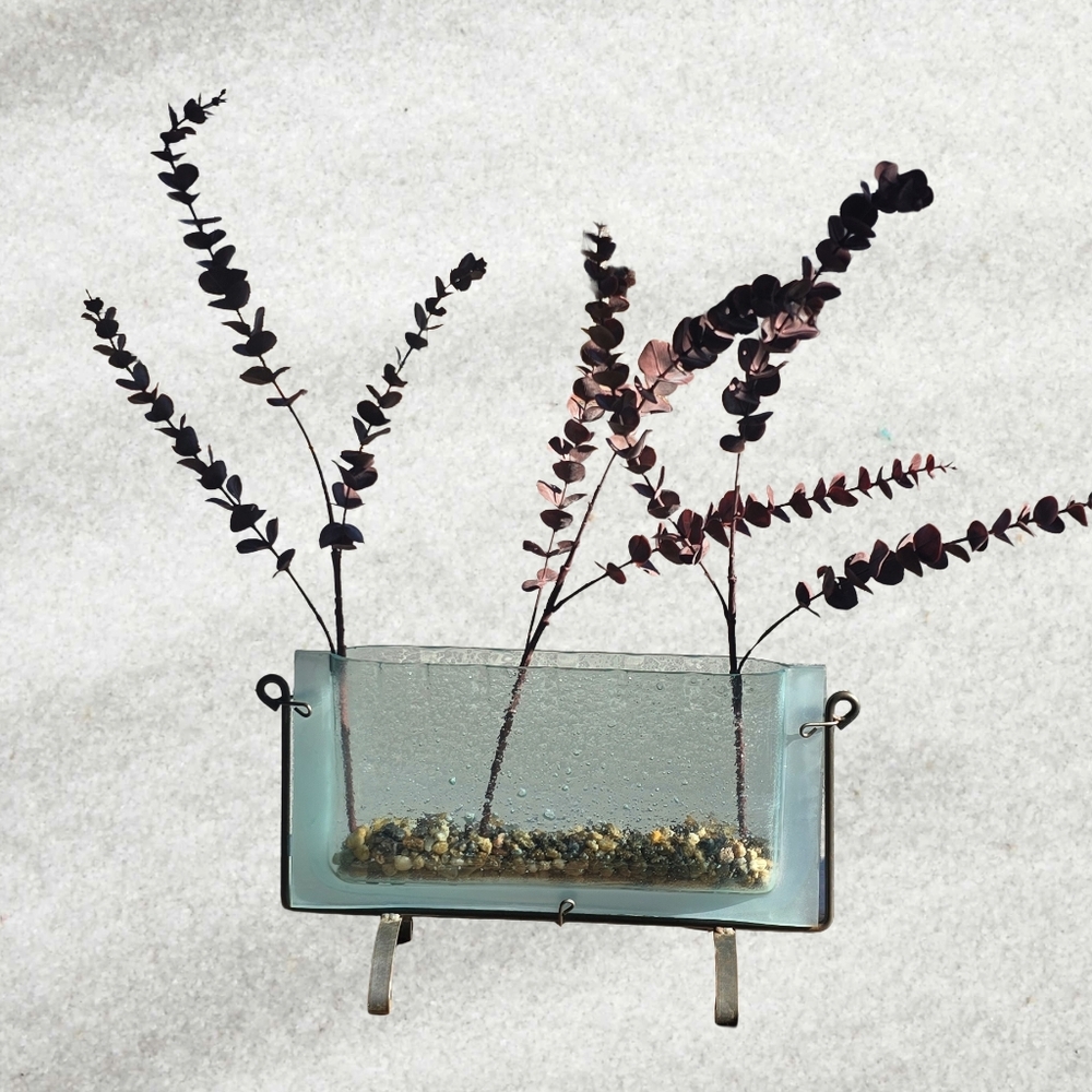 Glass Vase with Purple Eucalyptus. Indoor Bulb Growing.